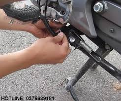 bão dưỡng chân chống xe máy